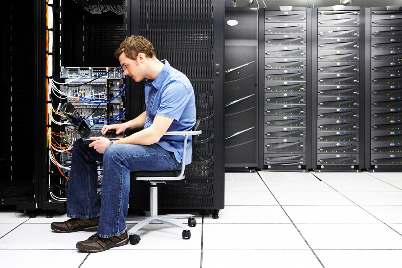 Technology, data storage, sitting in chair, technician