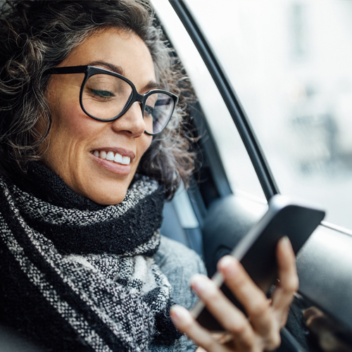 woman-waiting-ev-car-charging-getty-1284782728