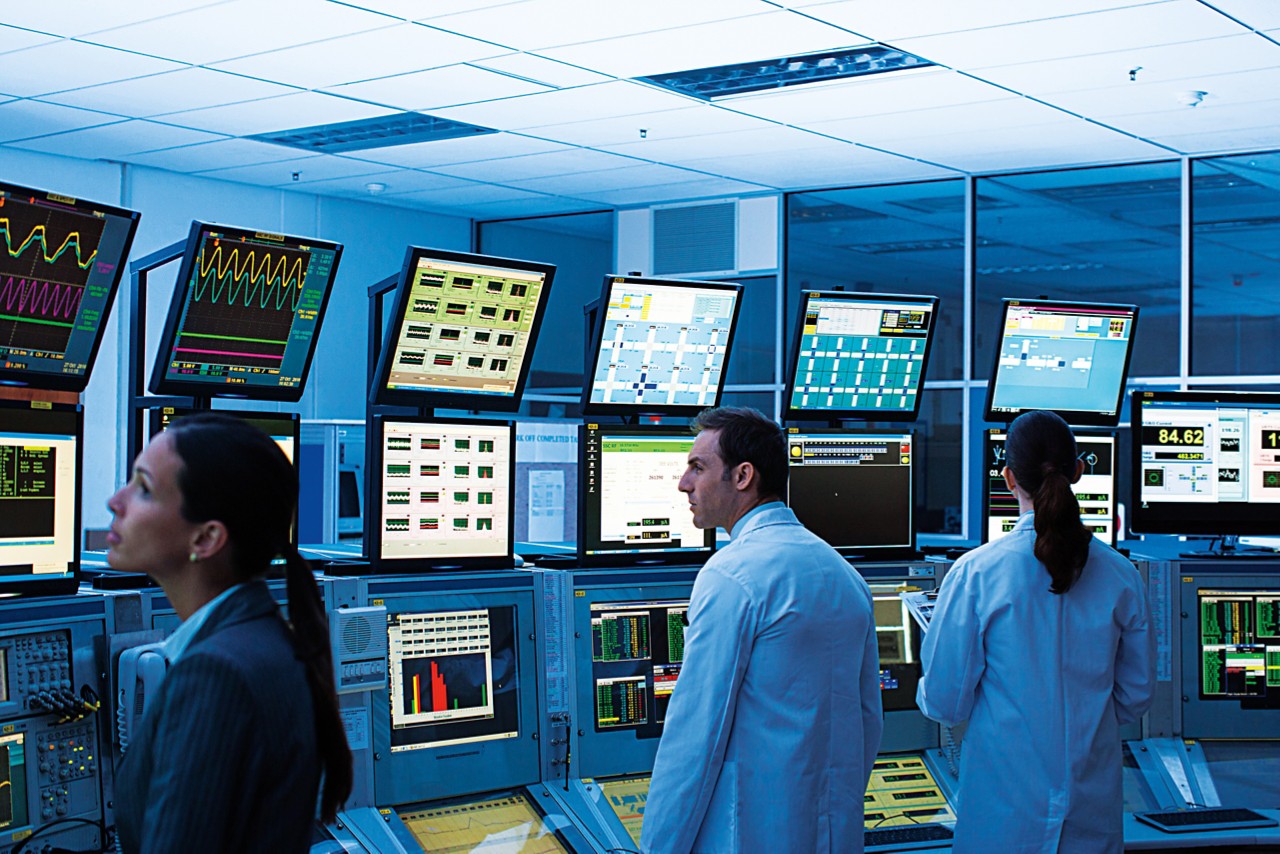 scientists-monitoring-computers-in-control-room-getty-171023639