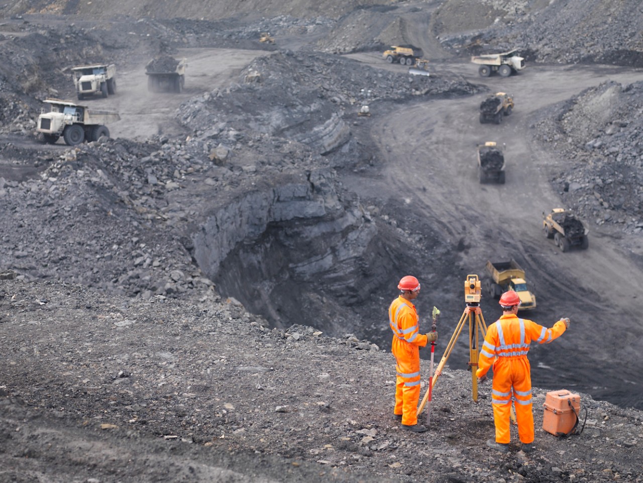 surface-mining-operations-engineers-survey-equipment-getty-96390208.jpg