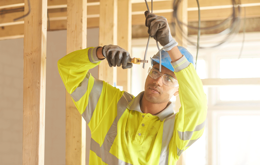 electrician-working-on-home-construction 1206538384