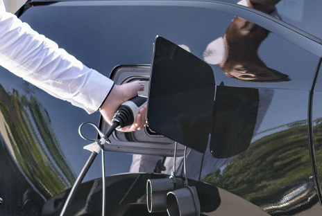 man-charging-ev-at-home-getty-683735009-low-res-cropped