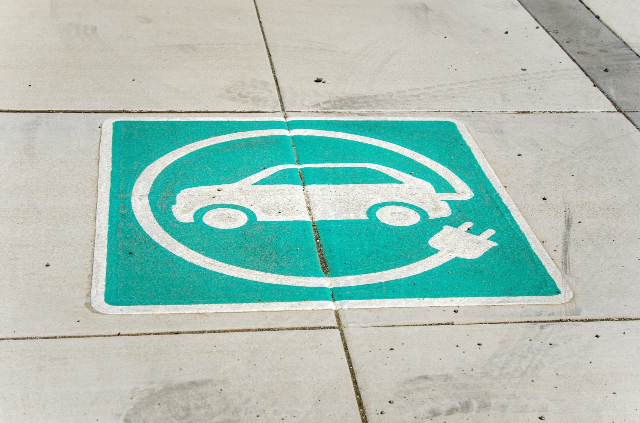 EV Charging station Sign on the Pavement