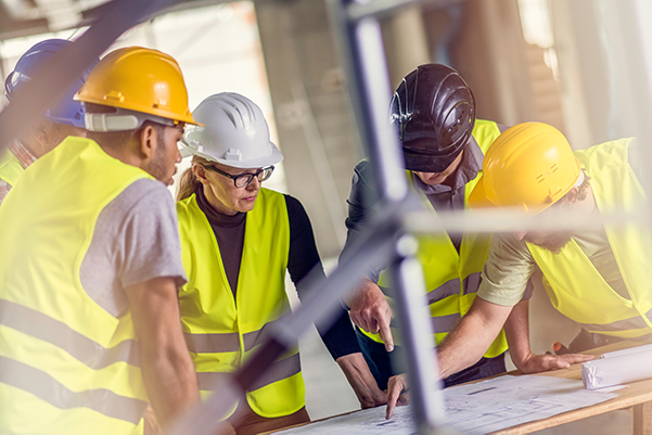 Architect-with-construction-engineers-getty-637902406