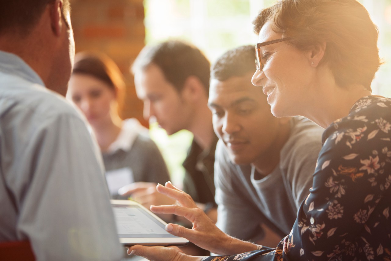 business people having conversation during meeting