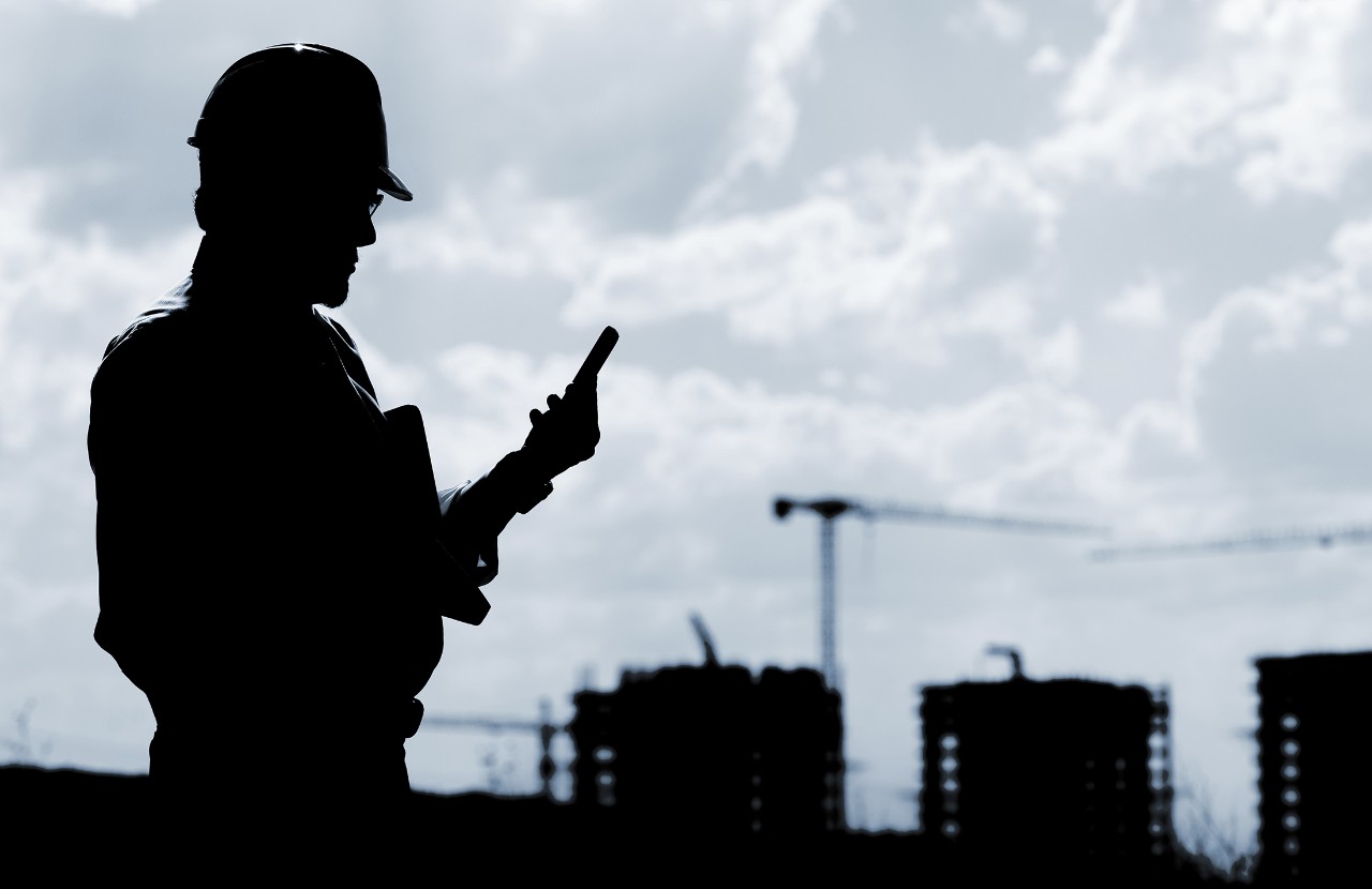 Engineer and cellphone.