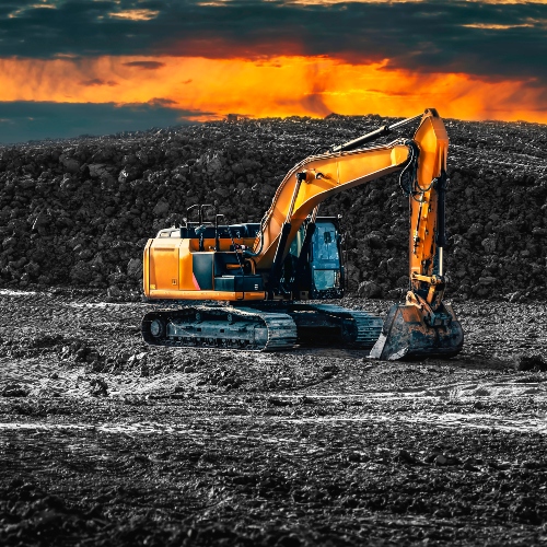 excavator-construction-site-dramatic-sunset-getty-1198889796.jpg